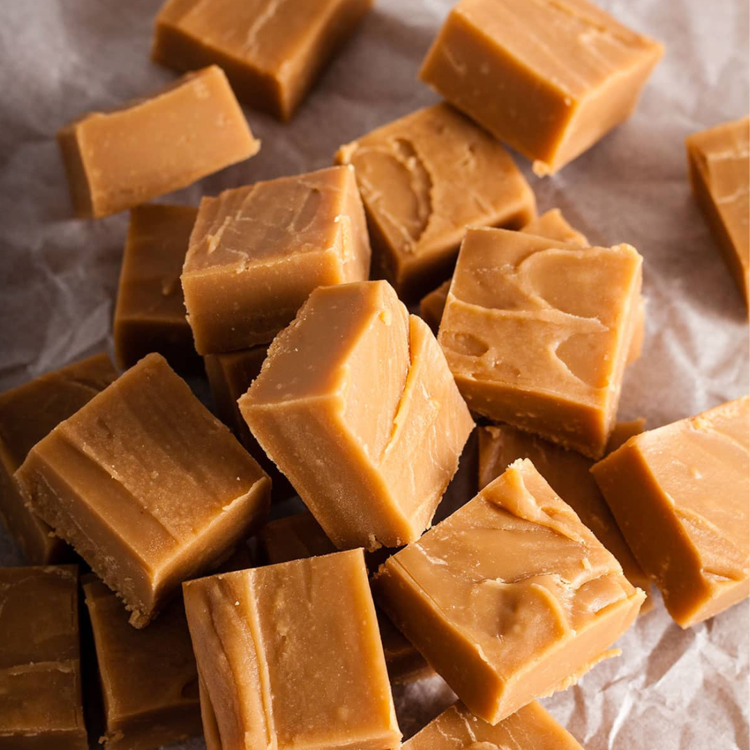 Handmade traditional vanilla fudge squares on parchment